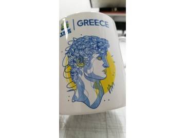 Сублимационная кружка «GREECE» (с лого ITM/TUI) с графикой «Аполлон в синем» и жёлтым контражуром — печать на кружках Уфа — НеоШтамп